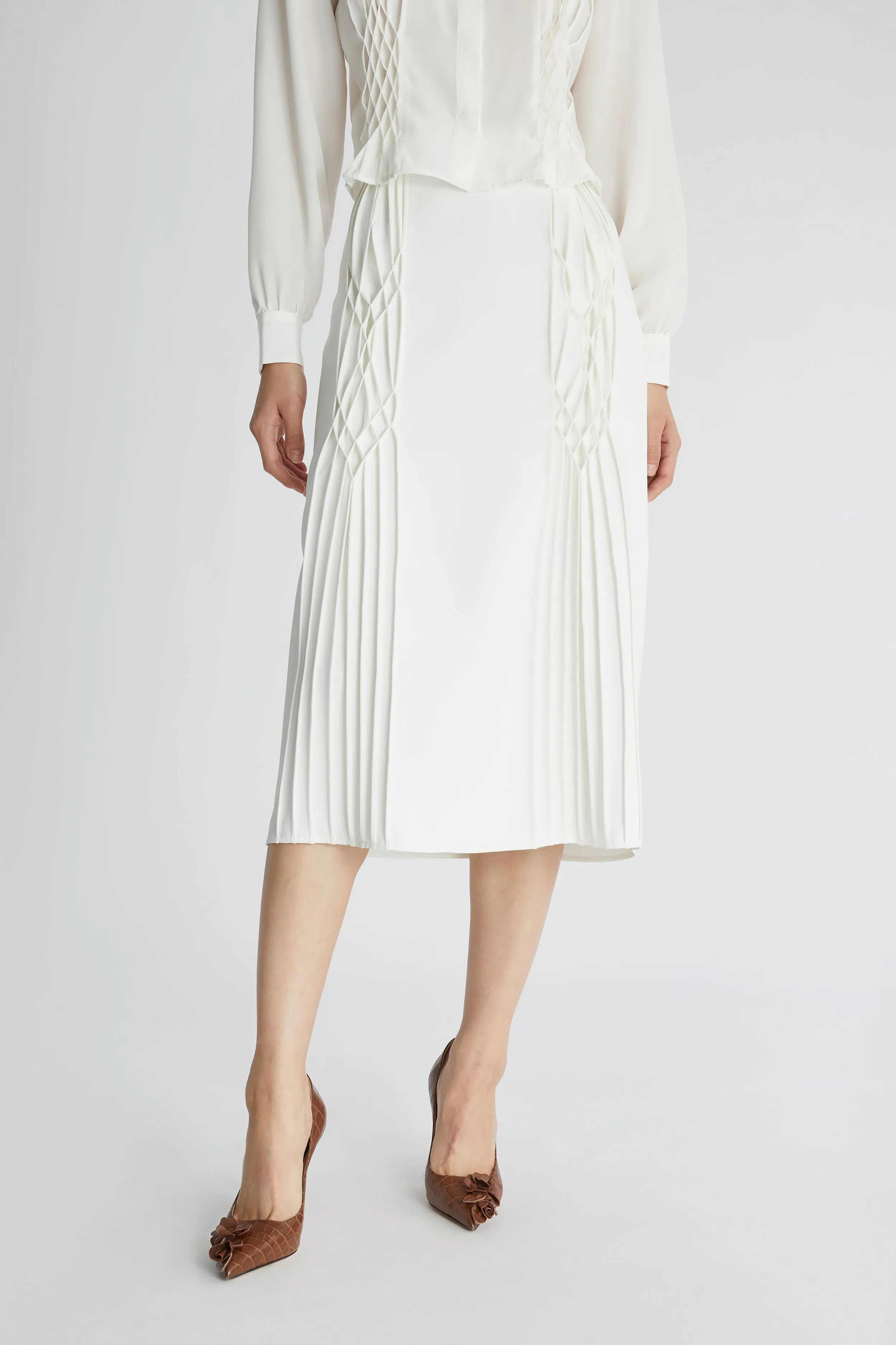 Pencil skirt with smock stitch