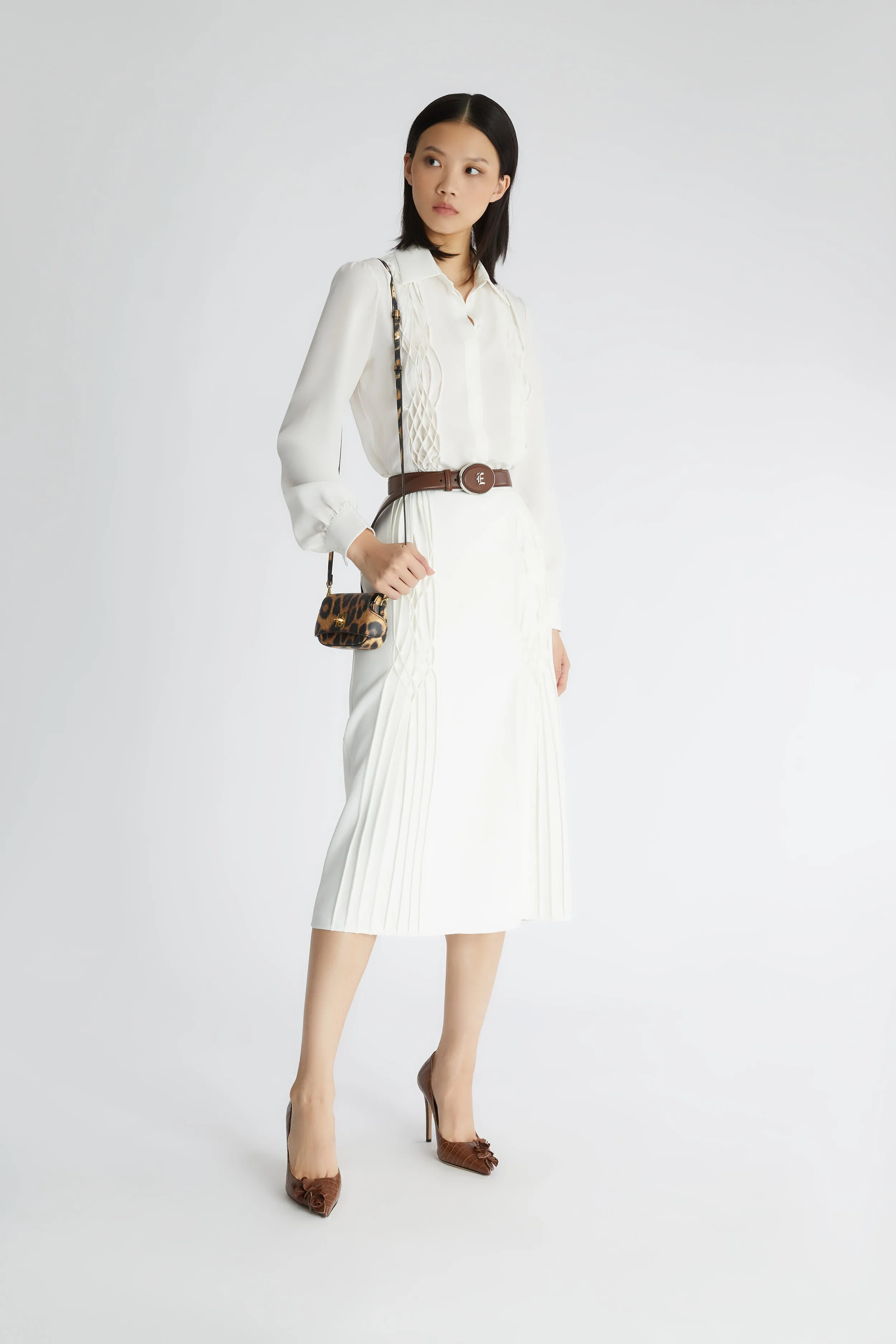 Pencil skirt with smock stitch
