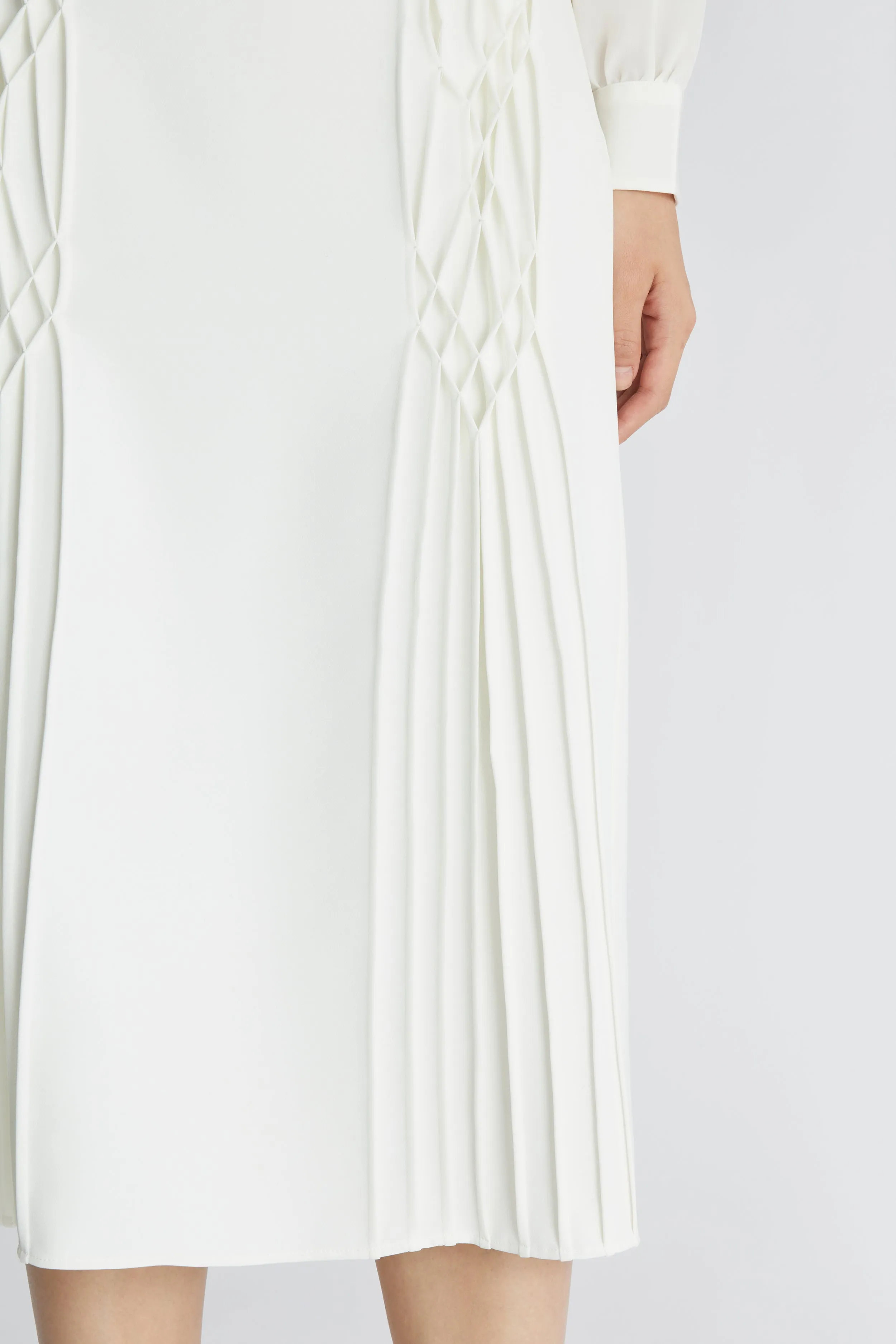 Pencil skirt with smock stitch