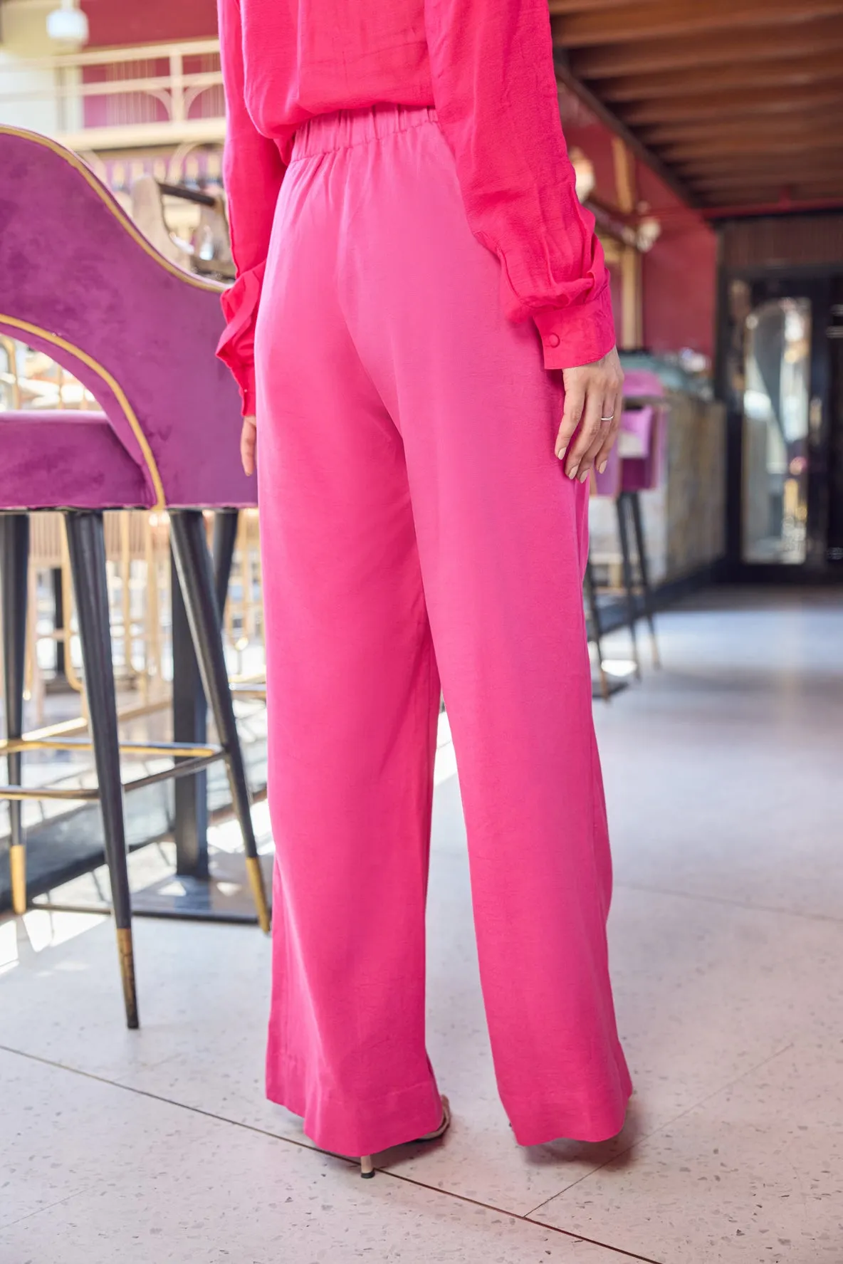 Pink Flared Pants With Pockets