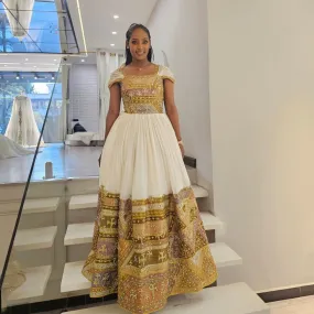 Shimmering Golden Habesha Dress: Beaded Cross Ornaments on Traditional Ethiopian Dress Gorgeous Ethiopian Wedding Dress