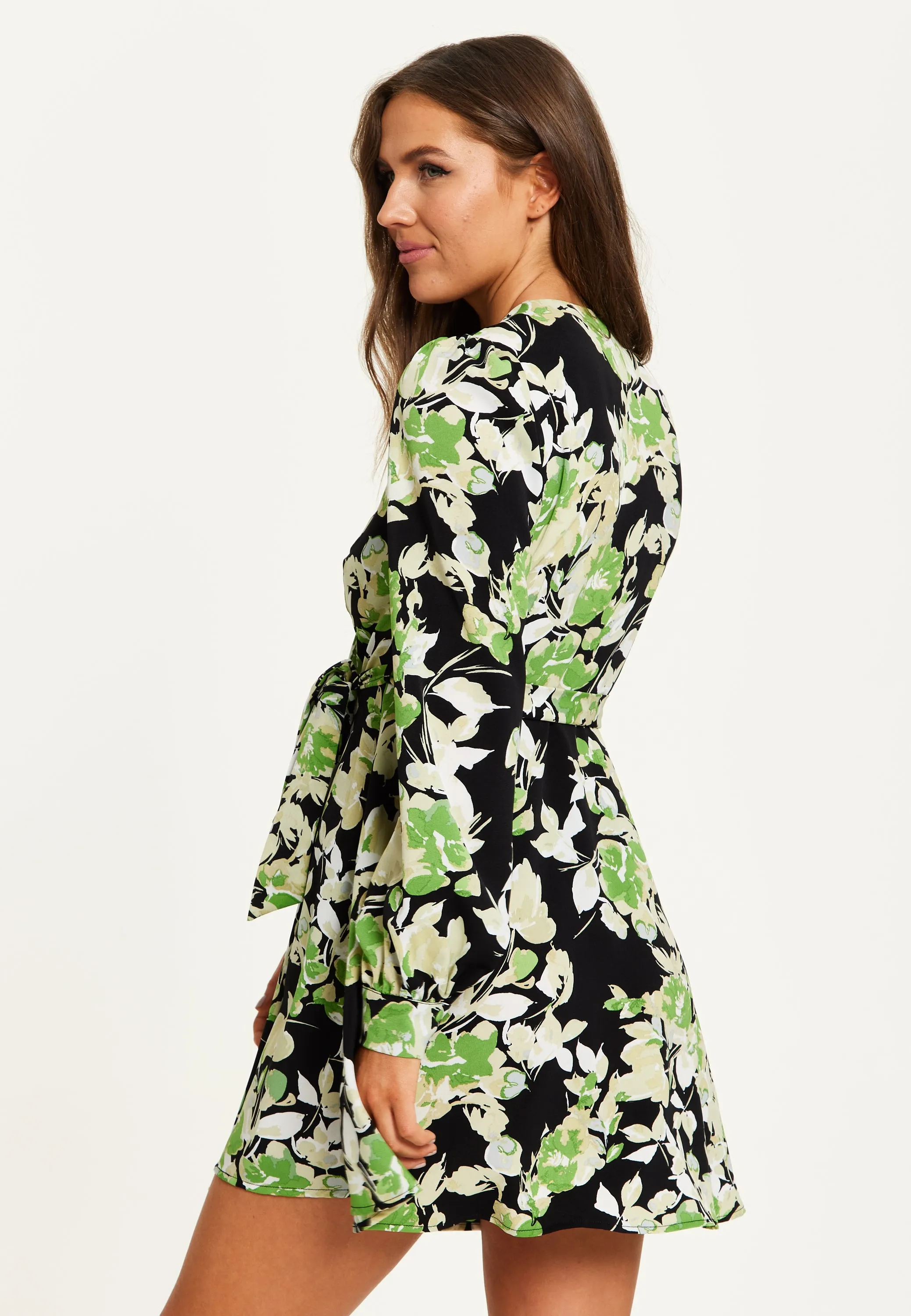 Women's Mini Dress in Black with Long Sleeves and Green Floral Print Wrap Style - Liquorish