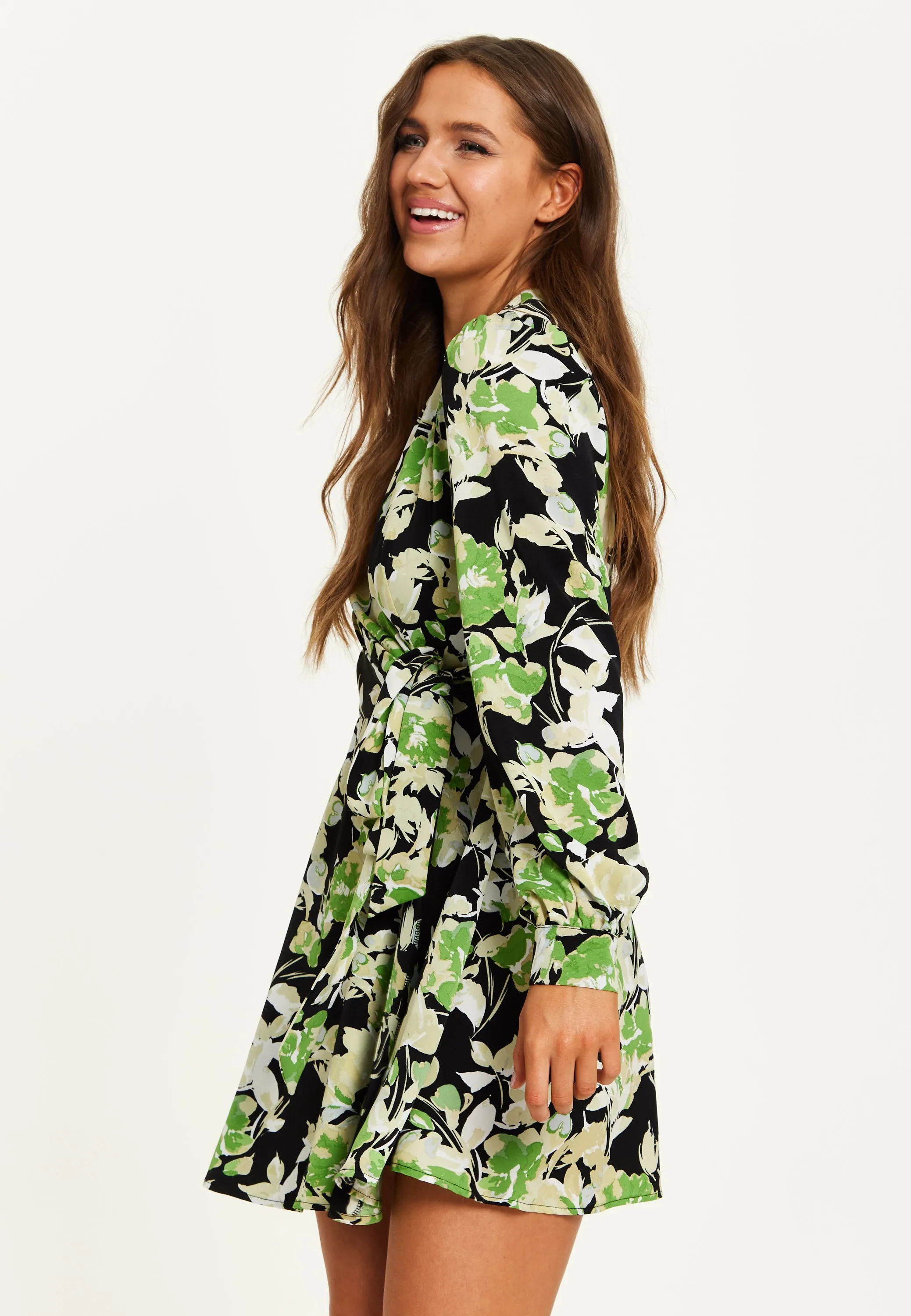 Women's Mini Dress in Black with Long Sleeves and Green Floral Print Wrap Style - Liquorish
