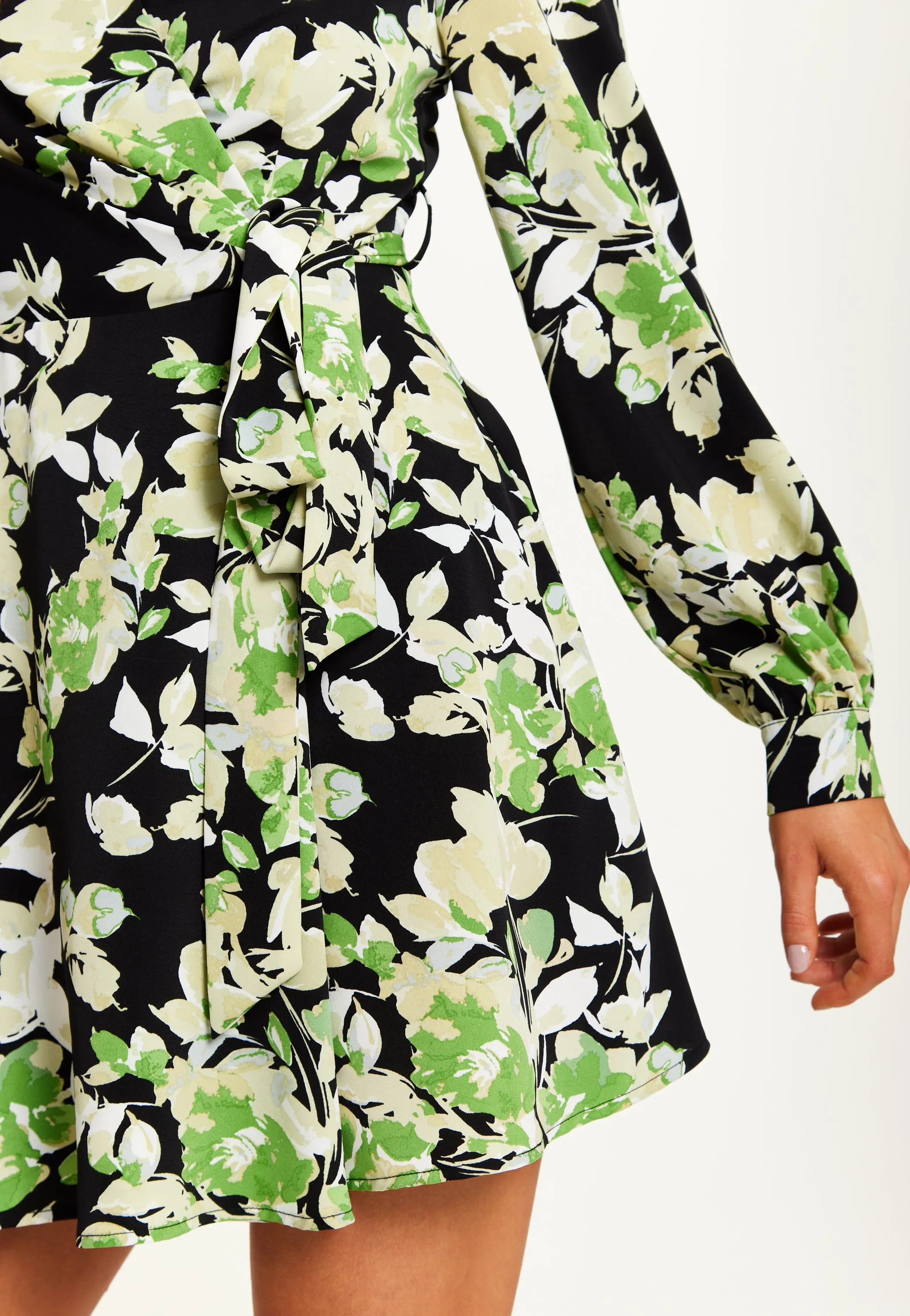 Women's Mini Dress in Black with Long Sleeves and Green Floral Print Wrap Style - Liquorish